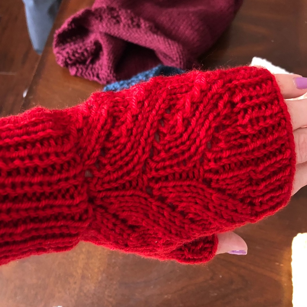 Hand knitted hand warmers